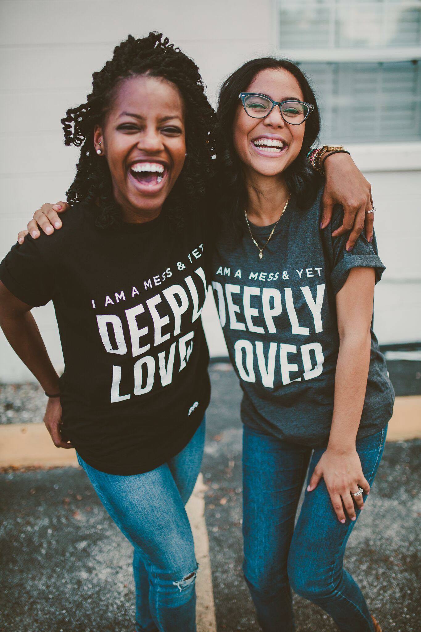 Two friends smiling and laughing